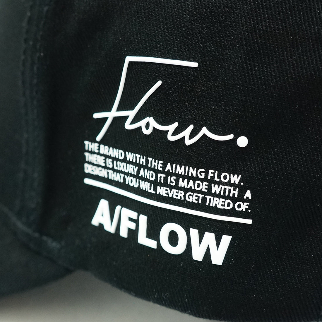 Flow メッセージ サイド ロゴ キャップ KSH347