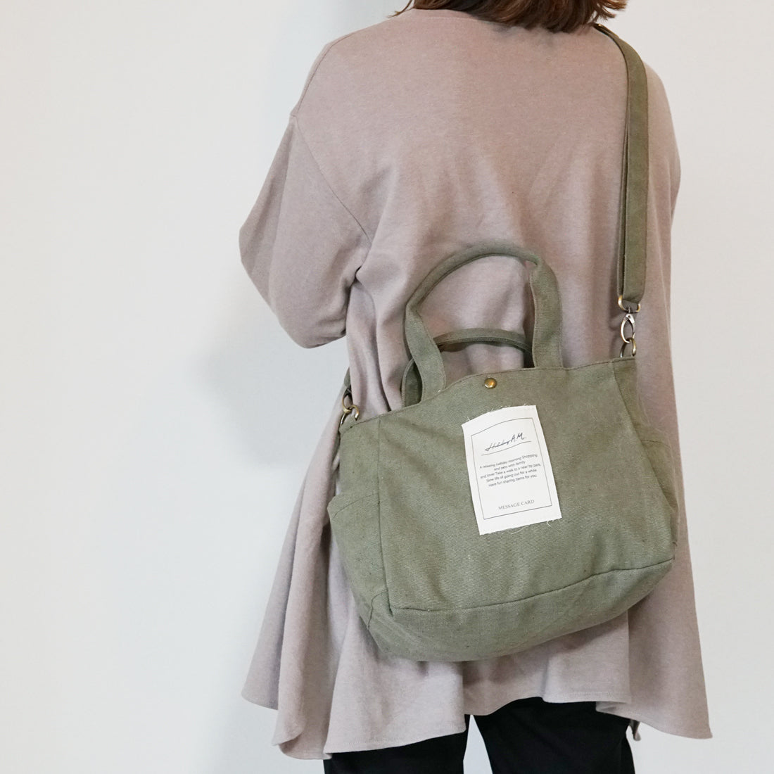 バッグ ショルダーバッグ メッセージラベル レディース メンズ キャンバス 帆布 HolidayA.M.
